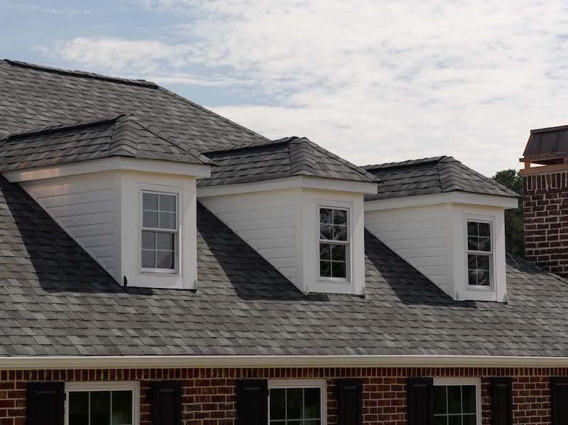 Georgetown Gray Landmark Architectural shingle close up of dormers with new vinyl windows