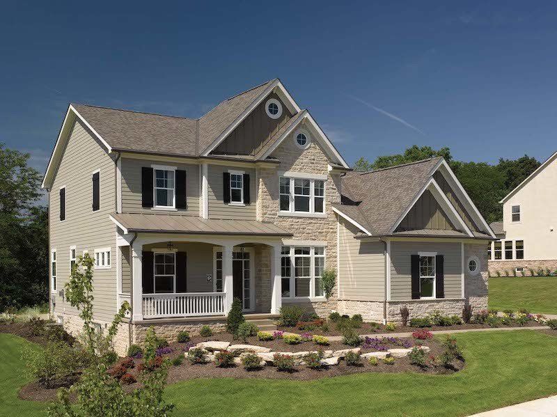 Weathered Wood Landmark Architectural Asphalt Shingle Residential Roof on a 2 story home with copper awnings