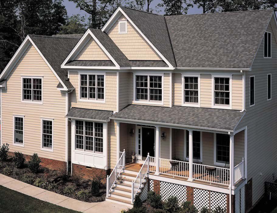 Weathered Wood Landmark Architectural Asphalt Shingle Residential Roof on a 2 story home