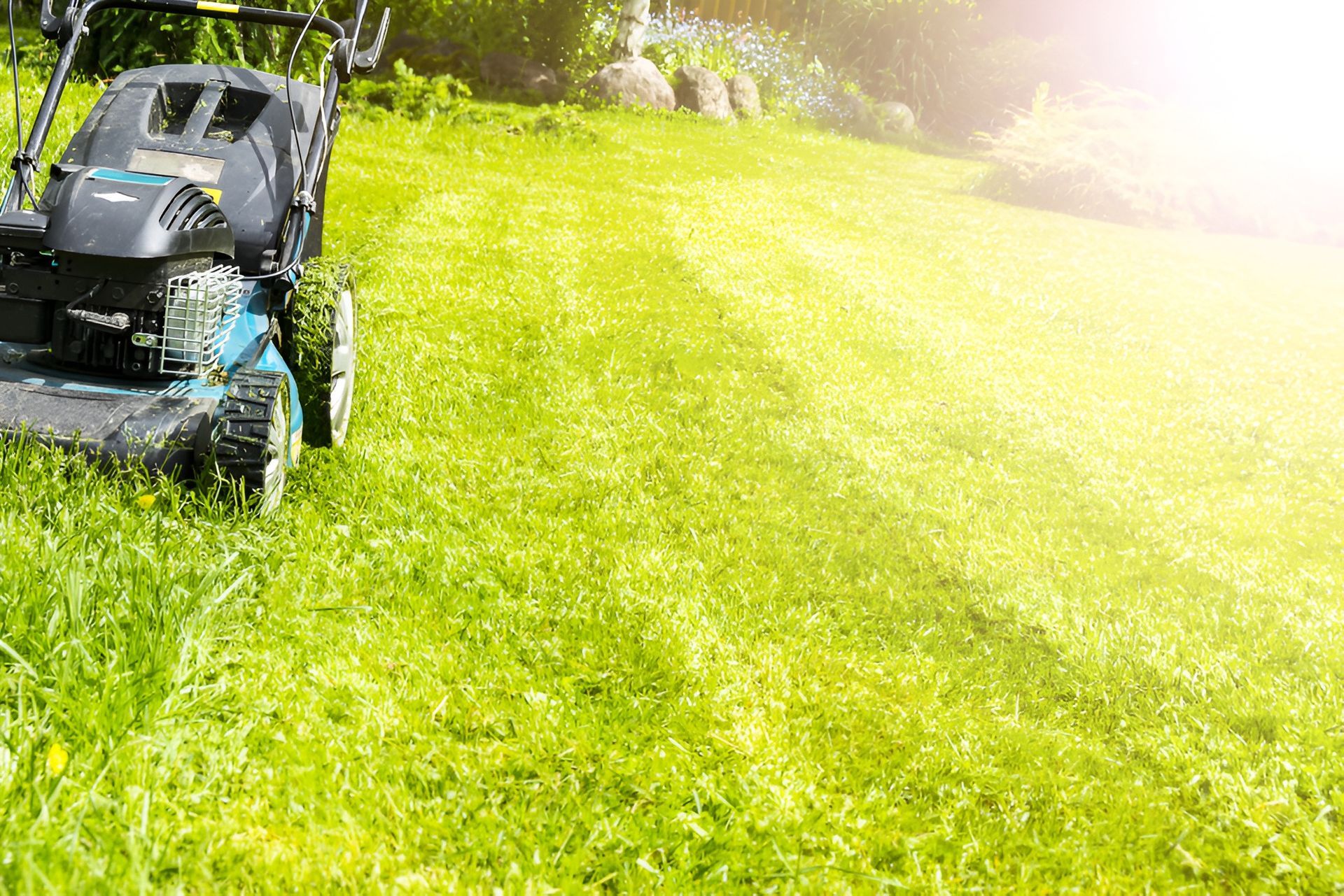 Lawnmower Cutting Grass on a Sunny Day — Garden City Slashing in Highfields, QLD