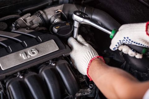 Hands Of Car Mechanic — Lithonia, GA — Martin Tire Co