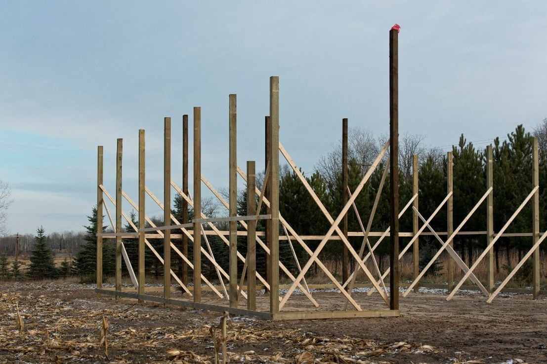 A Wooden Structure with Poles