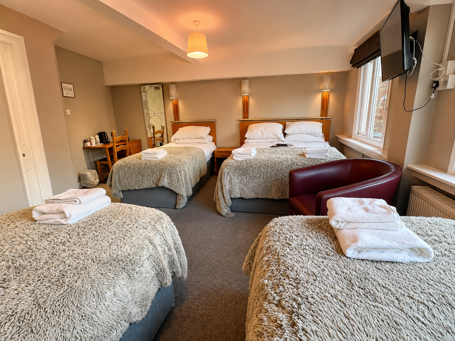 A double bed and up to 3 single beds 