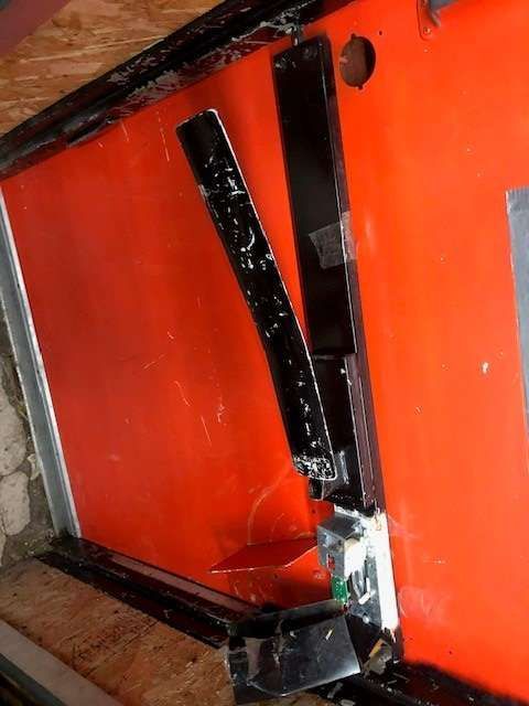 A red door with a black handle on it