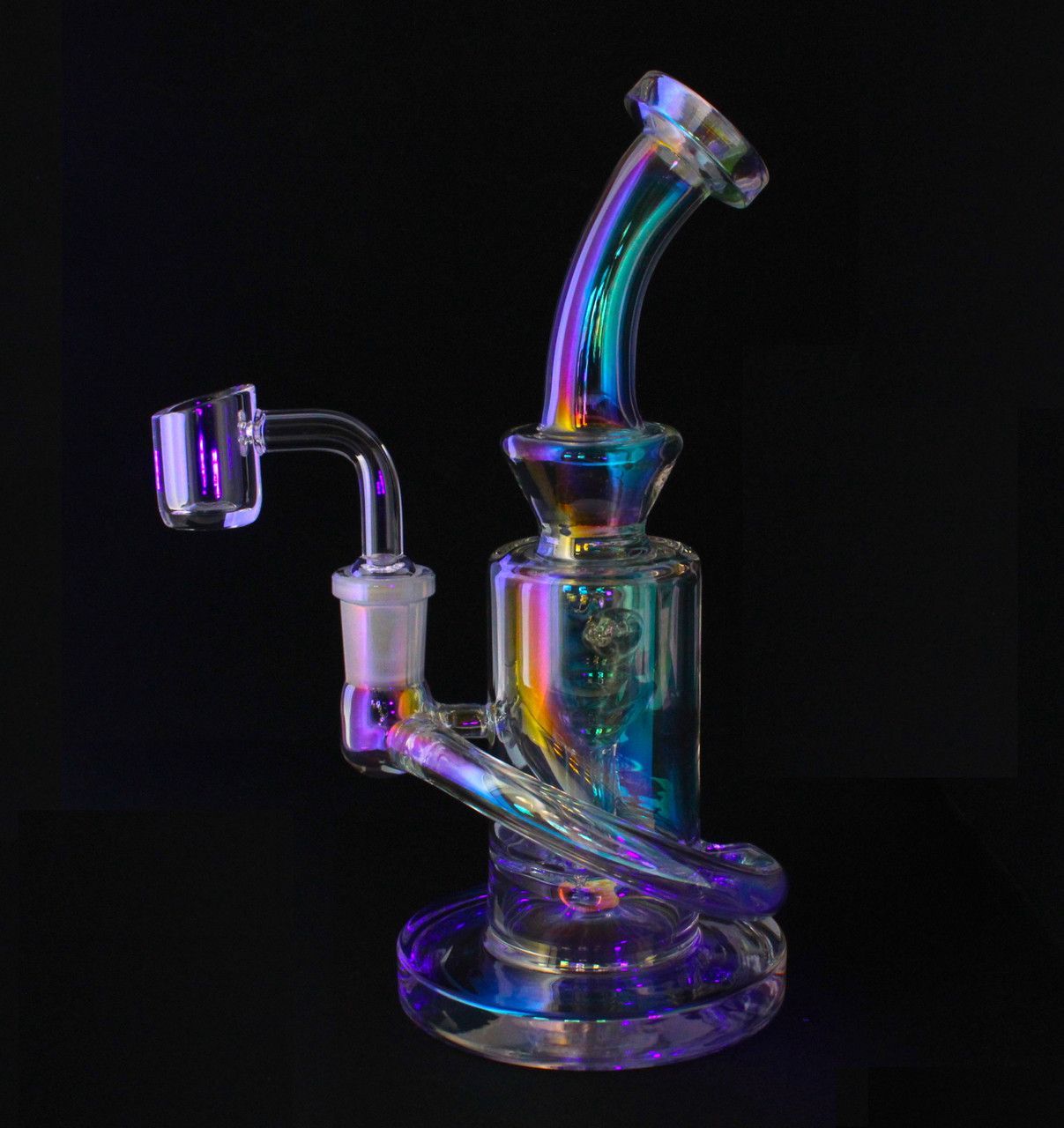 A rainbow colored glass bong with a quartz banger on a black background.