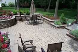 House Front Yard with Plants — Hardscape Materials in Schererville, IN House Front Yard with Plants — Hardscape Materials in Schererville, IN
