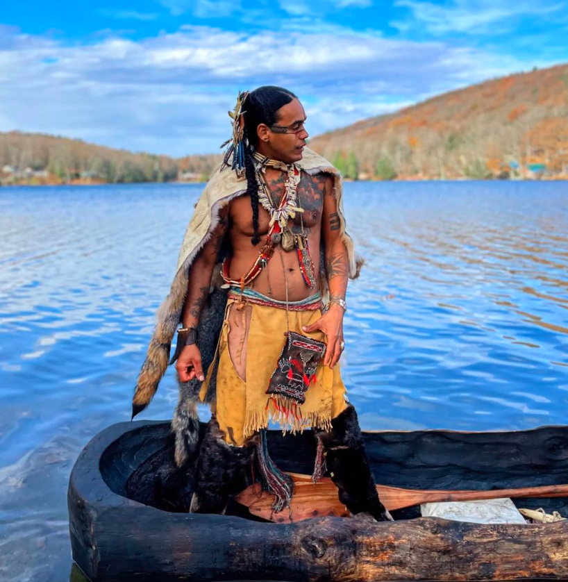 Andre Strongbearheart Gaines, Jr. in a canoe on a lake