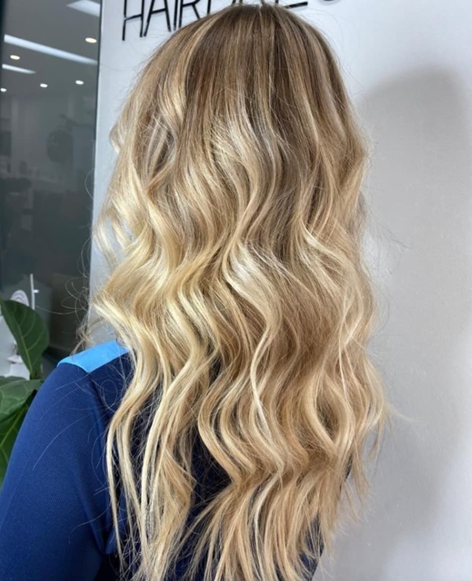 Hair Curling in Cairns Hairdressers At Work