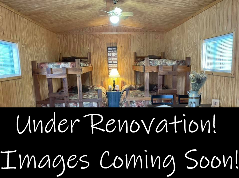 Interior room with two bunk beds; windows on either side. Text overlays: