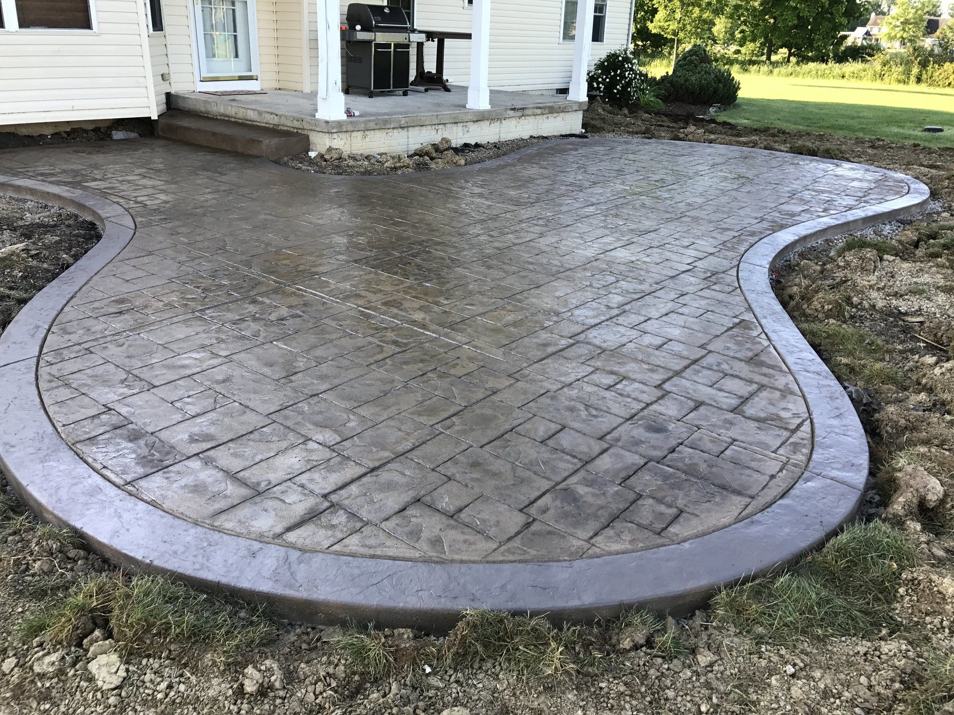 Backyard Patio with Stamped Concrete Floor | Strongsville, OH | Bella Cement