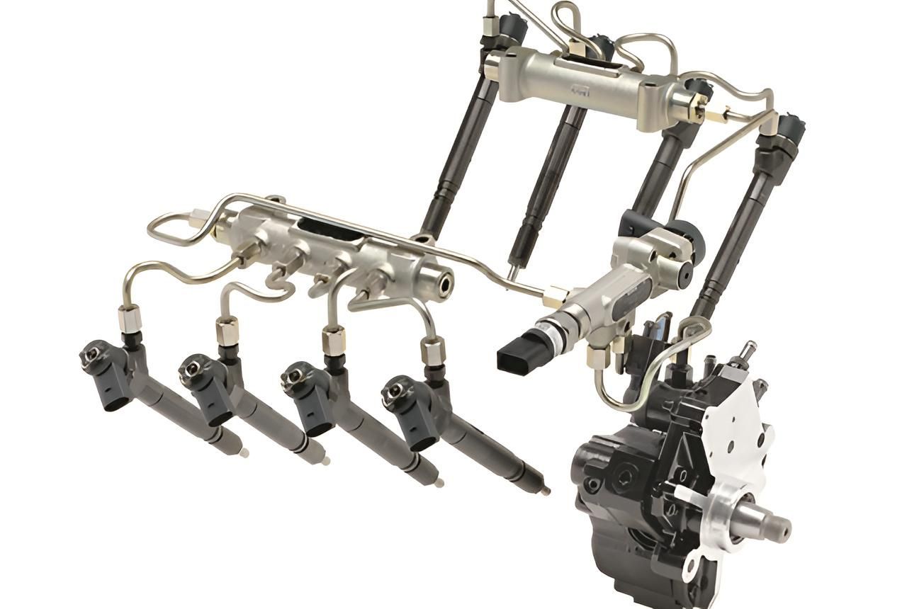 A Close Up Of A Fuel Pump And Injectors On A White Background — Reef Diesel Injection In North Mackay, QLD