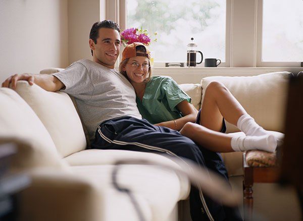 Couple in Living Room — Well Cleaning and Rehabilitation in Kokomo, IN