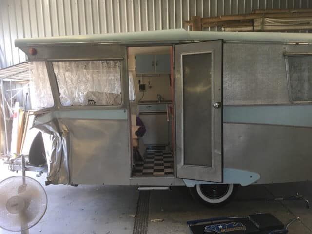 Vintage Camper With Open Door, Revealing Interior — Total Caravan Repairs in Forster, NSW