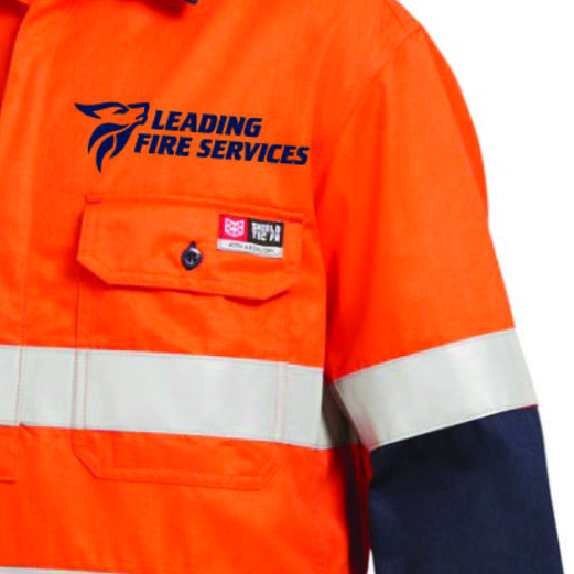 A close up of an orange shirt that says leading fire services