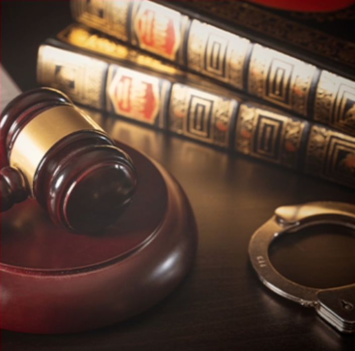gavel, law books, and handcuffs