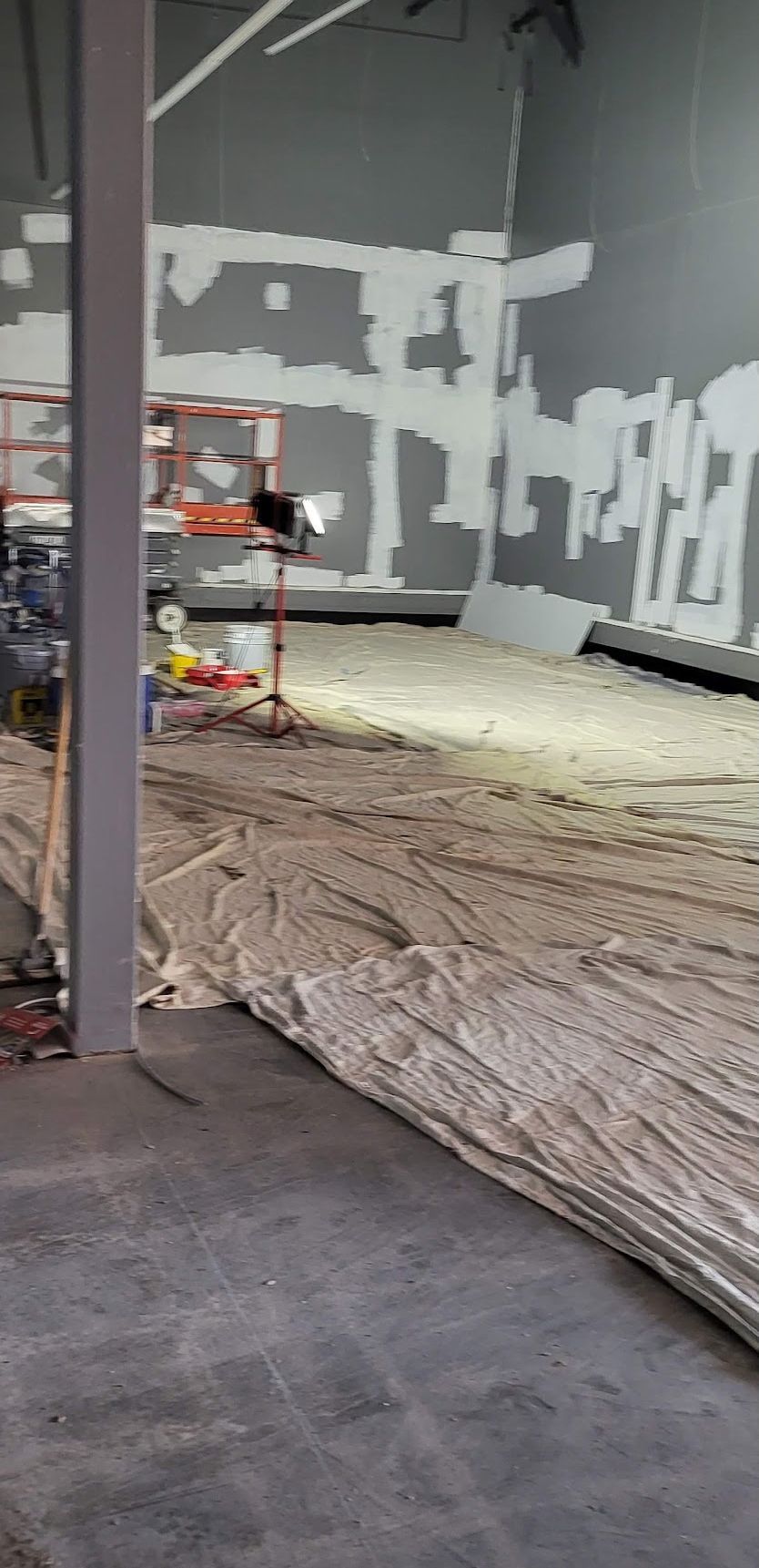 Construction in a large room.