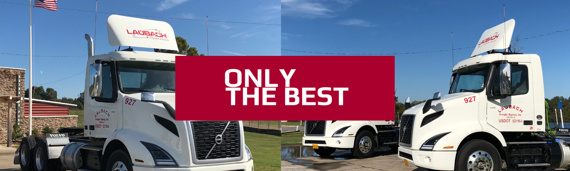 Two white semi-trucks parked outdoors side-by-side with a red 