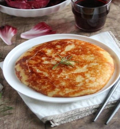 Piatto con frico di patate biologico della fattoria Zoff
