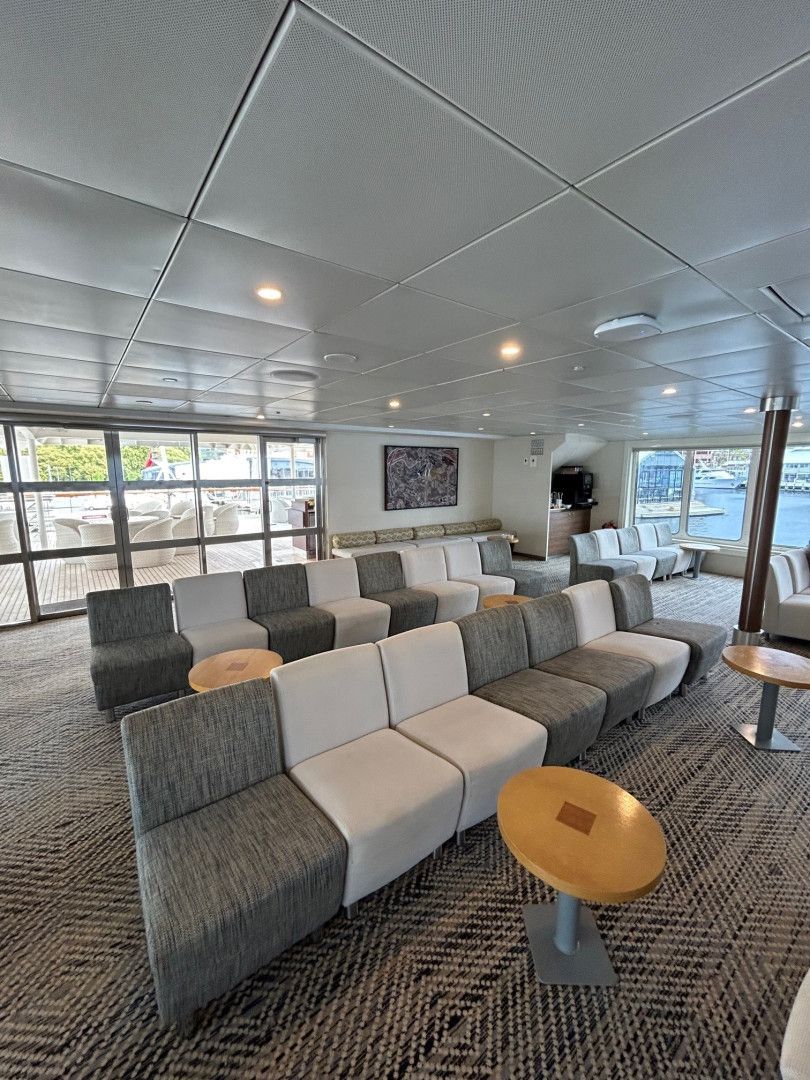 A Row of Boats Are Docked Next to Each Other — John Chisholm Flooring in Manunda, QLD