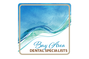 a logo for bay area dental specialists with a blue background