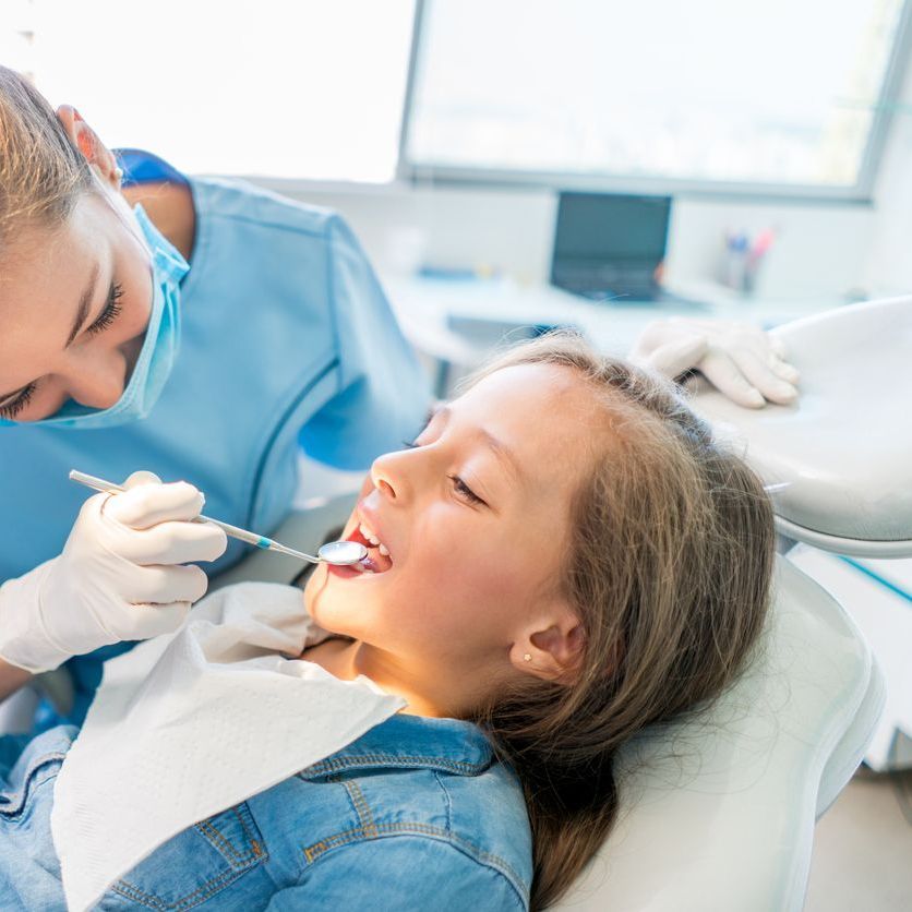 A kid having a dental visit