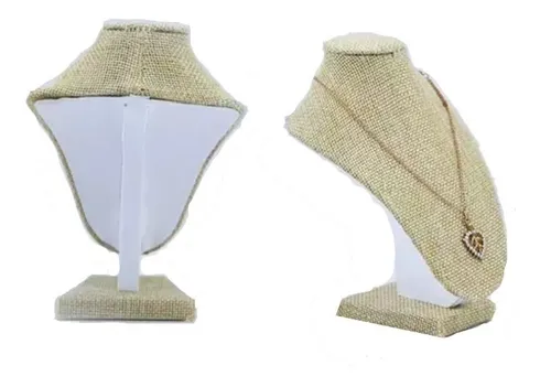 Dos bustos de exhibición de joyas cubiertos de arpillera