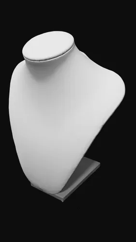 Busto de exhibición de joyas de color blanco sobre fondo negro.