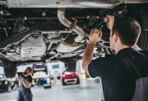 Man working on underneath of vehicle | Automotive Repair Specialists