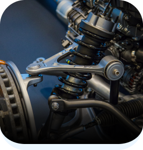 Up close to suspension on vehicle | Automotive Repair Specialists