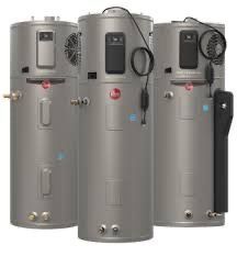 Three silver Rheem water heaters with control panels, vents, and wiring.