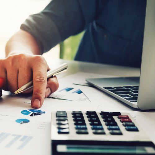 Payroll Services — Accountant Working on Charts in Petersburg, VA