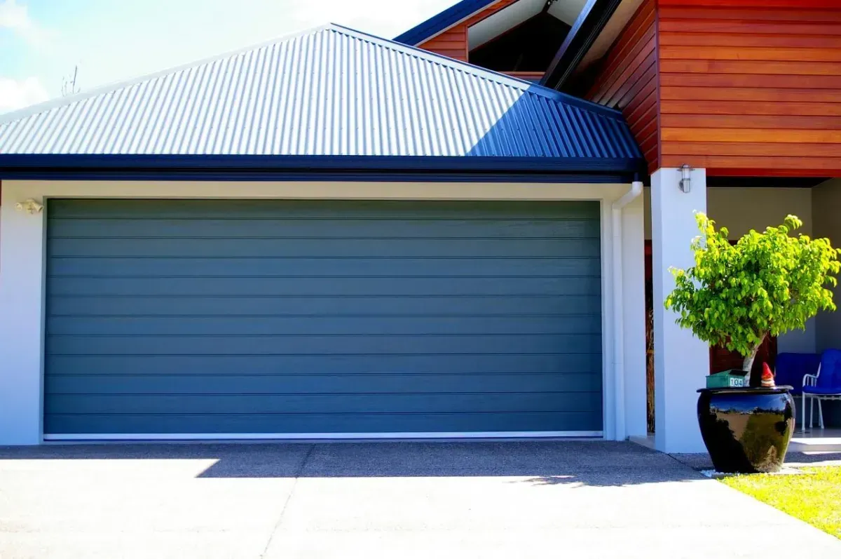 Garage with Blue Garage Door — Hastings Garage Door Services in Port Macquarie
