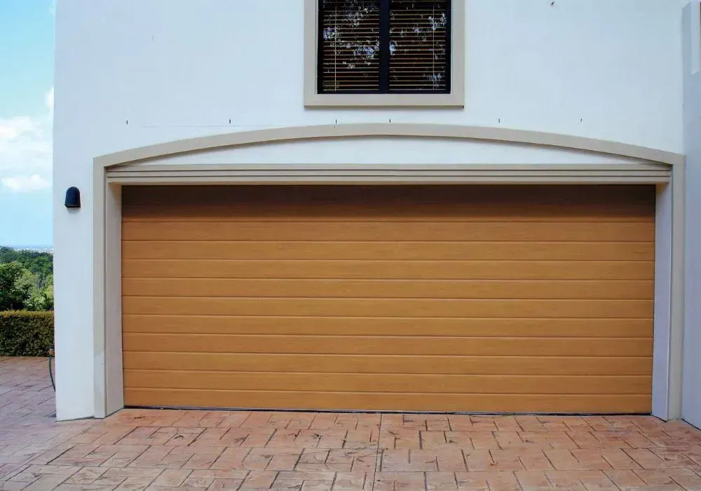 House with Garage Door — Hastings Garage Door Services in Port Macquarie