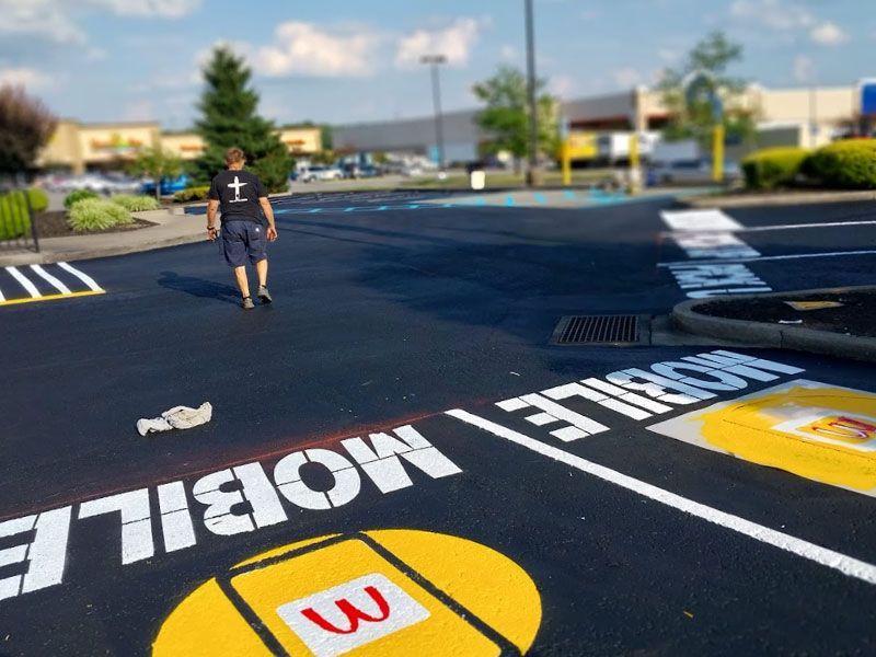 Parking lot paving and sealcoating