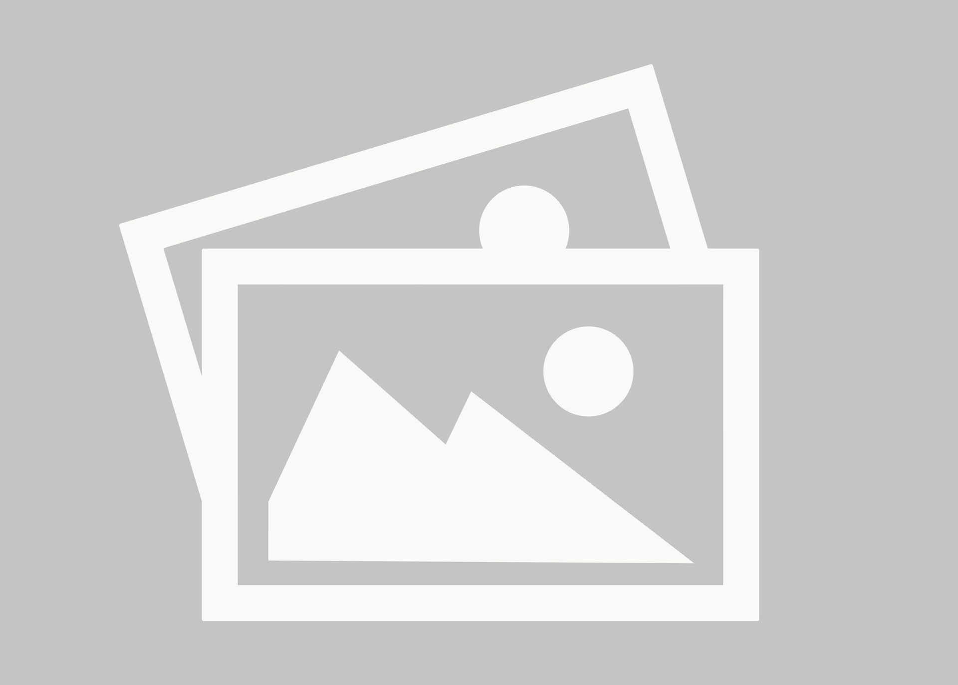 Two overlapping white picture frames on a gray background.