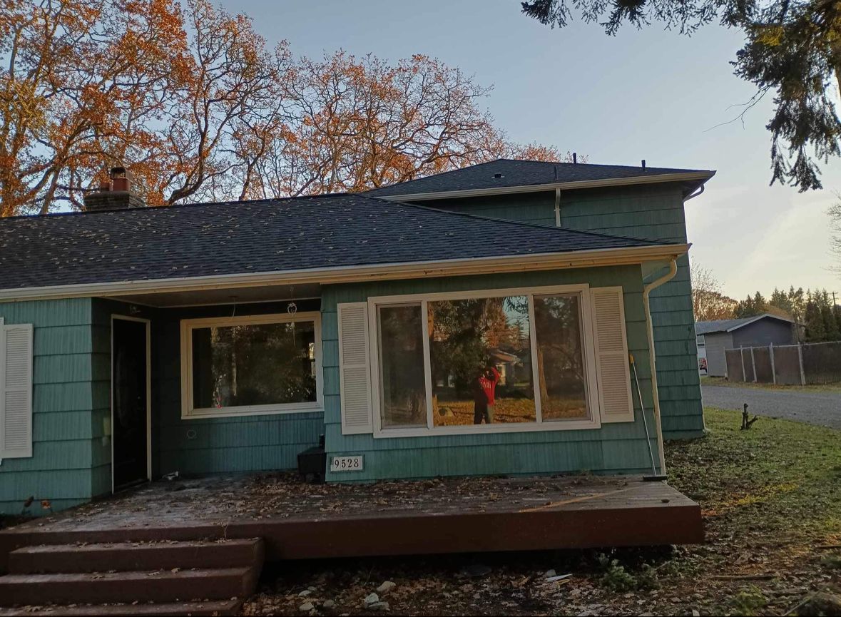 Teal House With New Gutter — Lacey, WA — Seamless Gutters Troy Services LLC