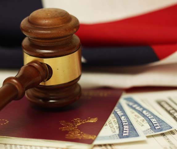 Gavel on passport and documents