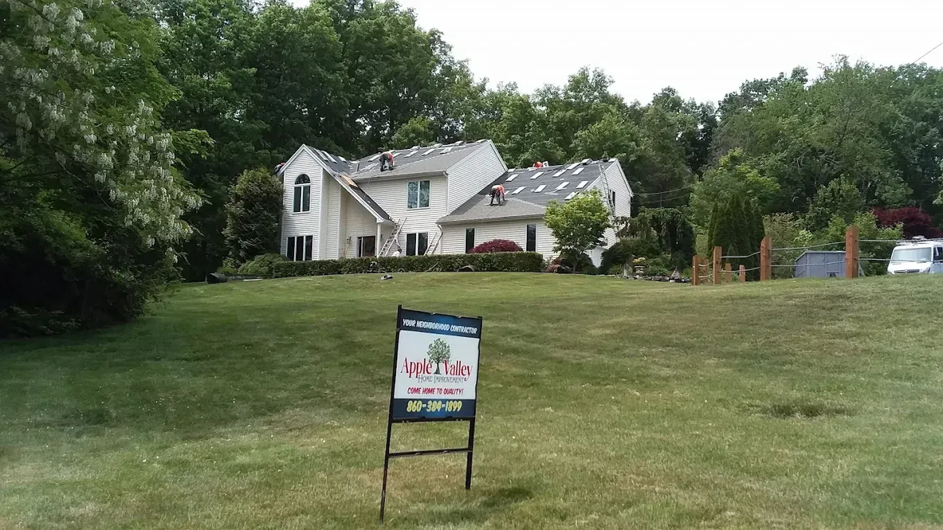 White two-story house with a 