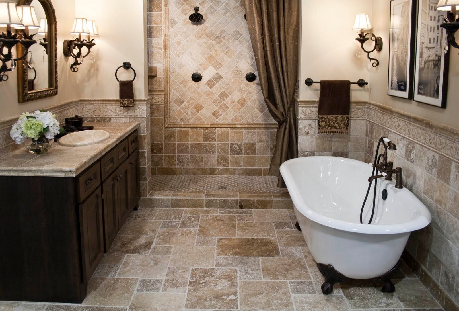 Bathroom with brown tile, clawfoot tub, dark wood vanity, and shower.