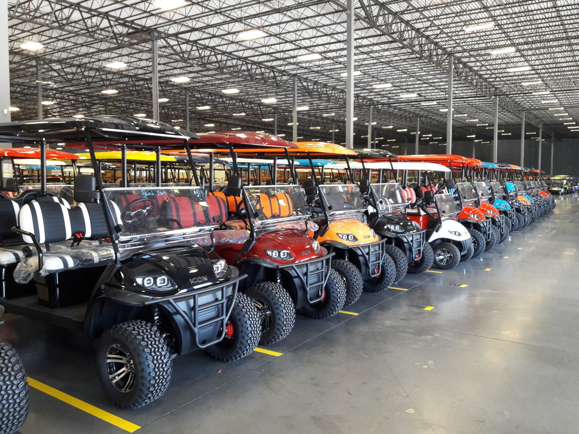 Golf Carts In Warehouse — St. Petersburg, FL — Ed Burns Bay Area Golf Cars