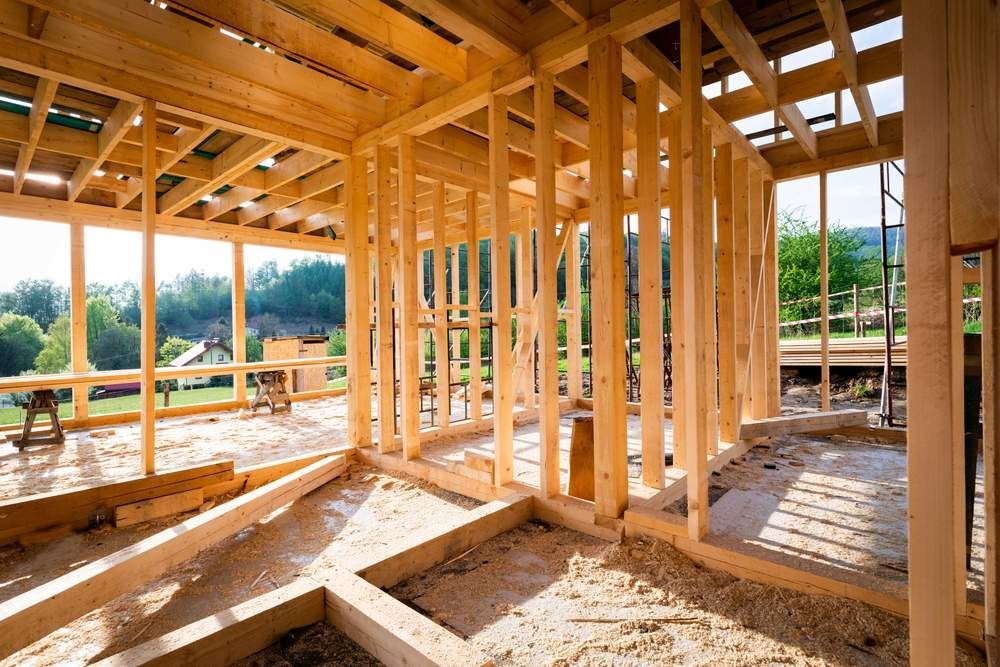 The Inside of a Wooden House Under Construction — Shane Rice Builder & Renovation Specialist In Southside, QLD