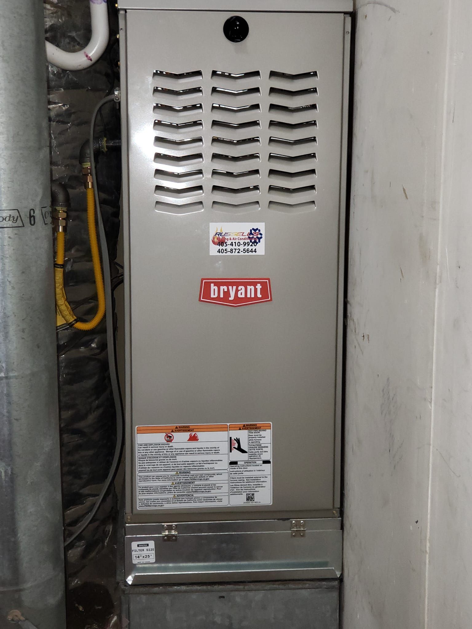 A bryan air conditioner is installed in a basement