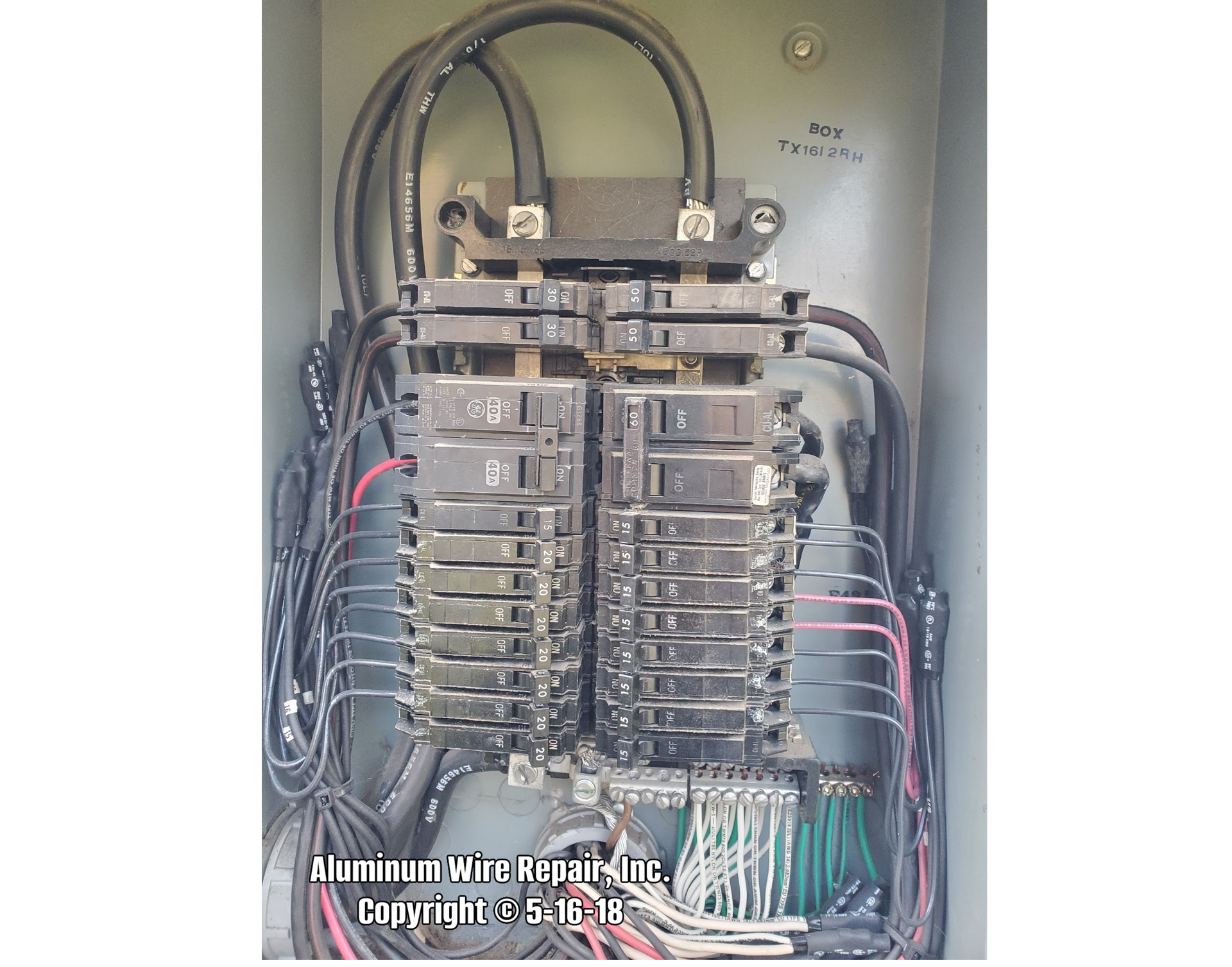 A picture of a piece of aluminum wire repair