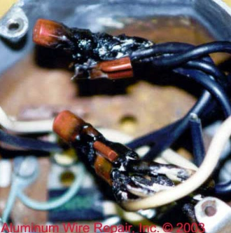A close up of aluminum wire repair inc. 2003