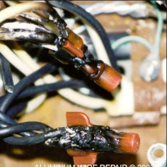A bunch of wires are laying on a table with the words aluminum wire repair on the bottom
