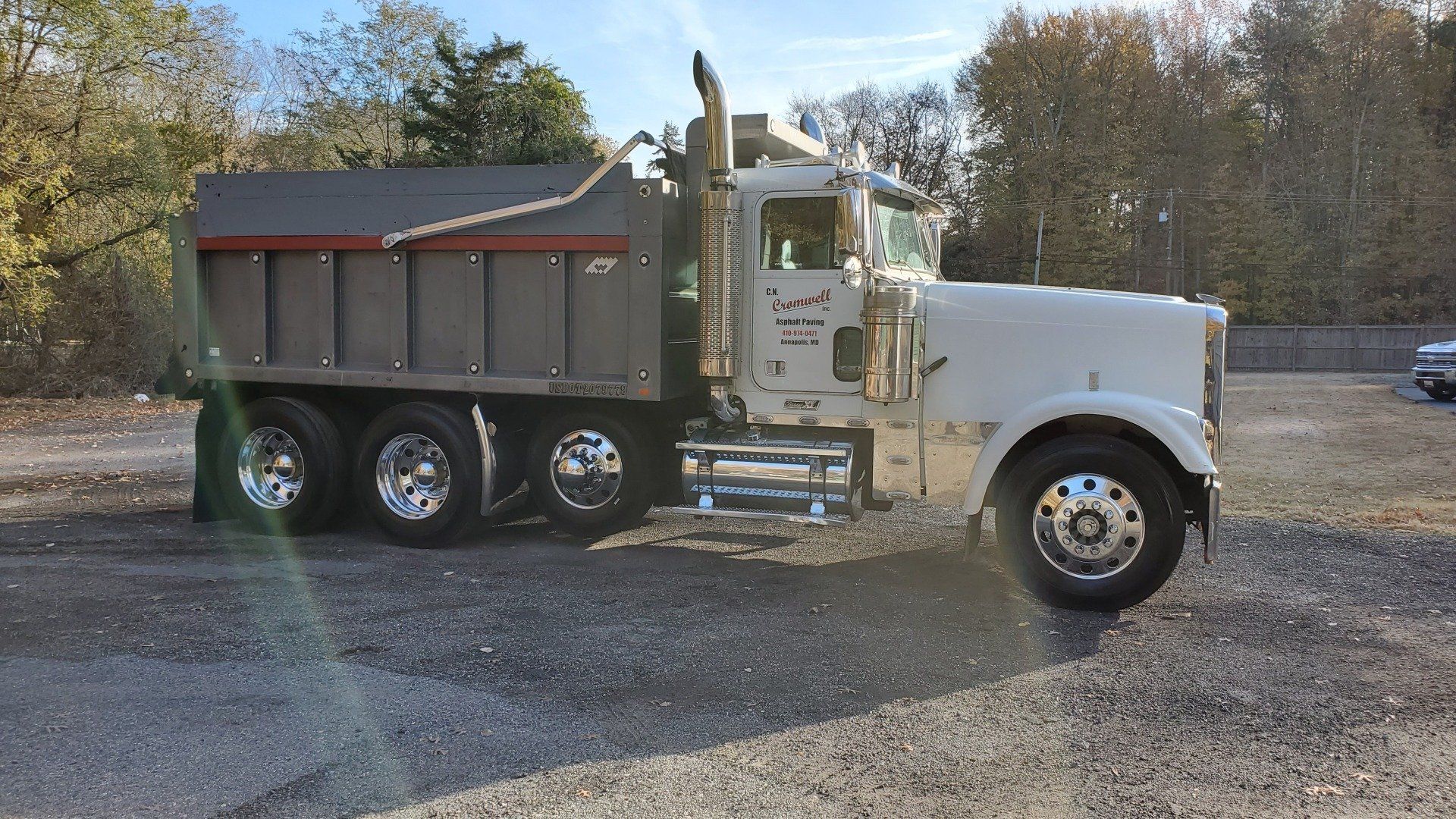 A dump truck parked in a parking lot