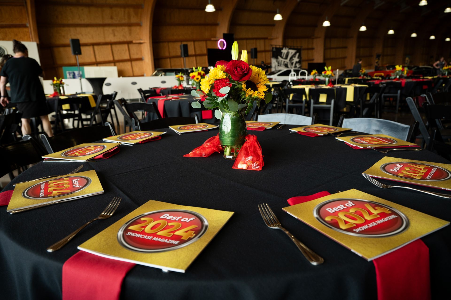 A table with a vase of flowers on it