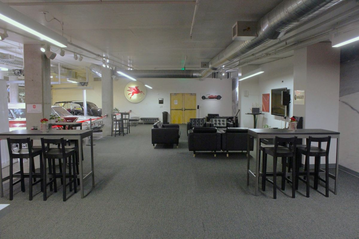 A large room with tables and chairs in it