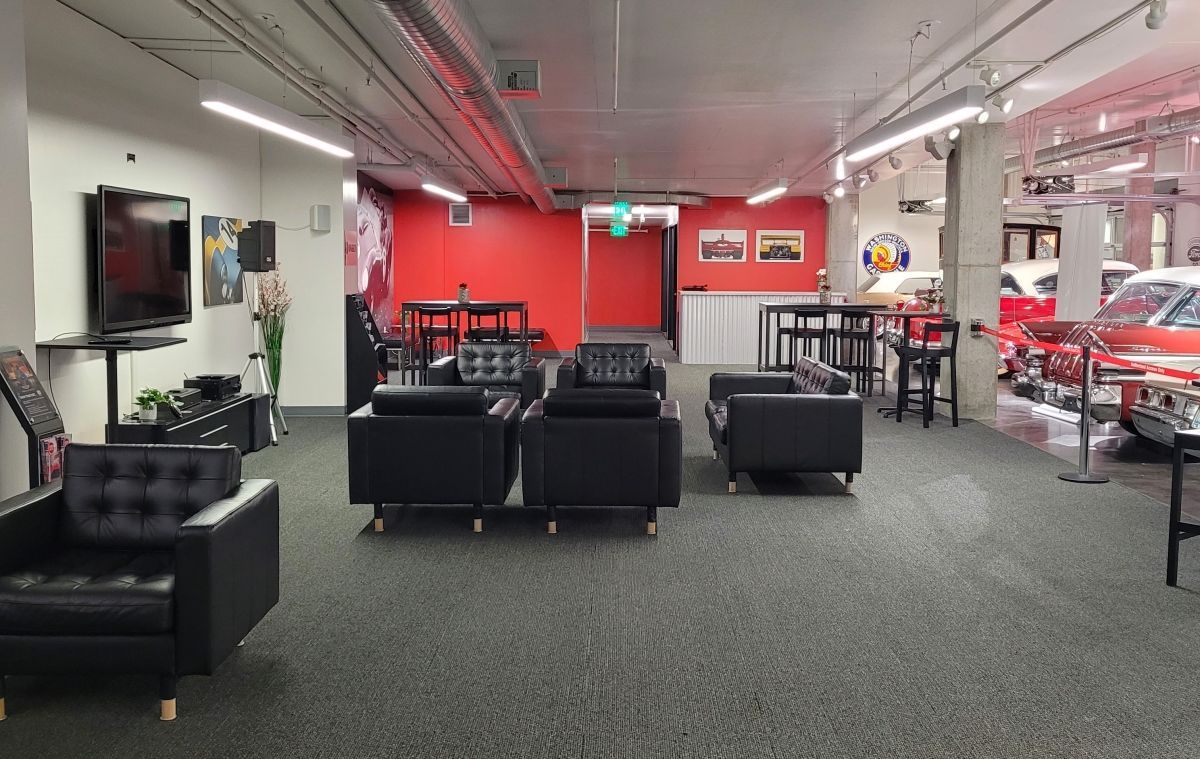 A large room with a lot of chairs and tables