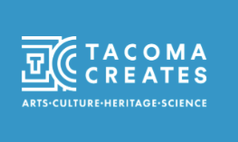 A tacoma creates logo on a blue background